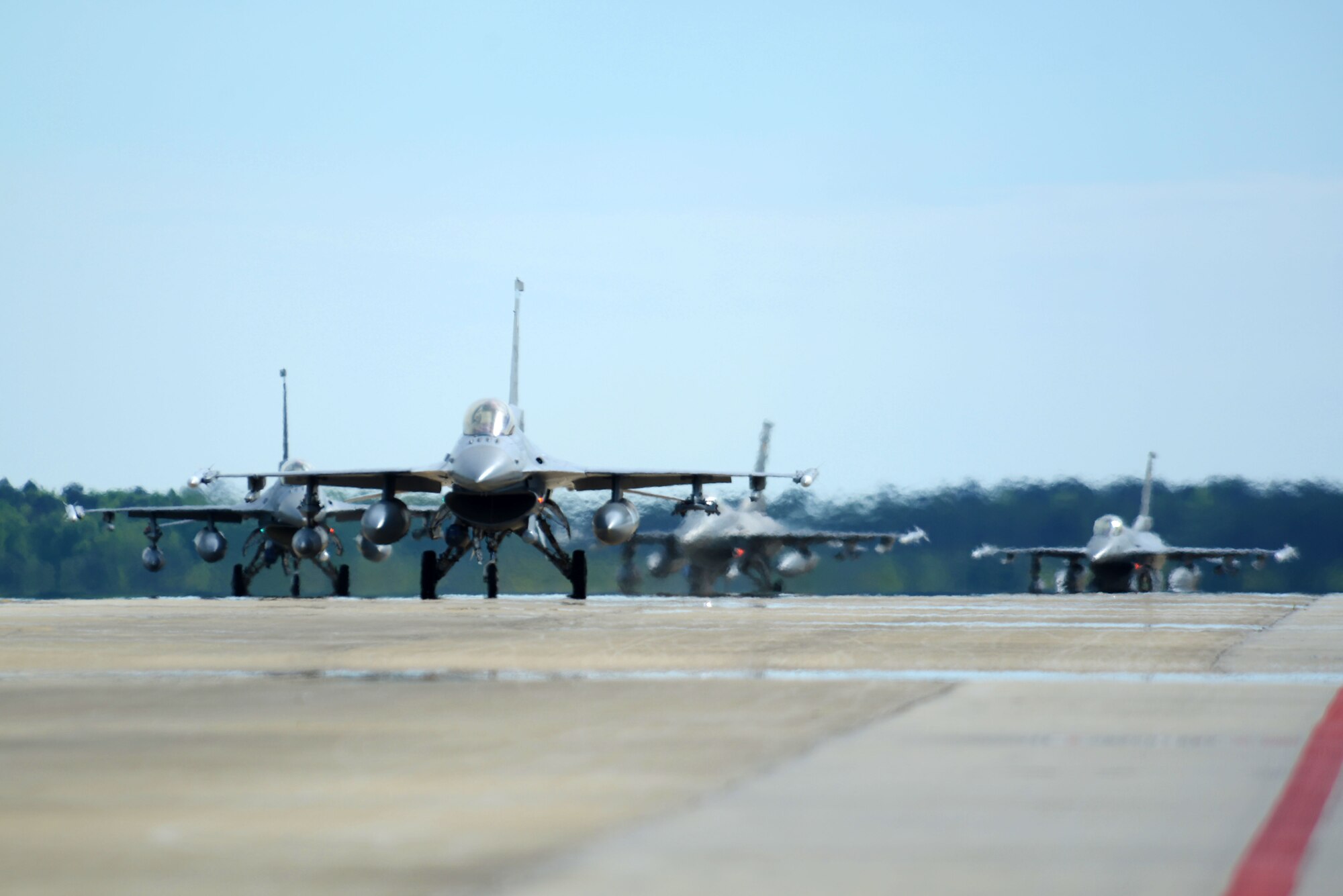 U.S. Airmen assigned to the 20th Fighter Wing return from a deployment at Shaw Air Force Base, S.C., April 10, 2016. Approximately 300 Airmen deployed to the United States Central Command Area of Responsibility for six months. (U.S. Air Force photo by Airman 1st Class Kelsey Tucker)