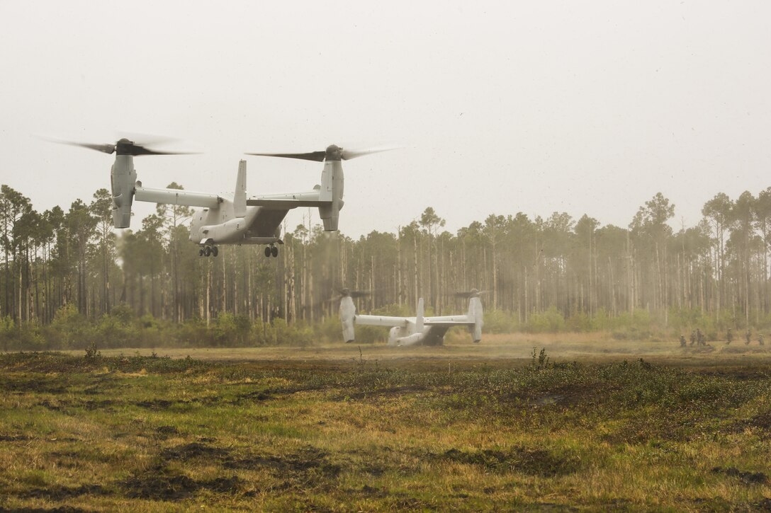 A V-22 Osprey lands to insert Marines with 2nd Battalion, 8th Marine Regiment during a platoon attack training event at Camp Lejeune, N.C., April 12, 2016. The training was focused on ensuring the Marines understood the fundamentals of operating efficiently on a larger scale to prepare for potential future engagements.