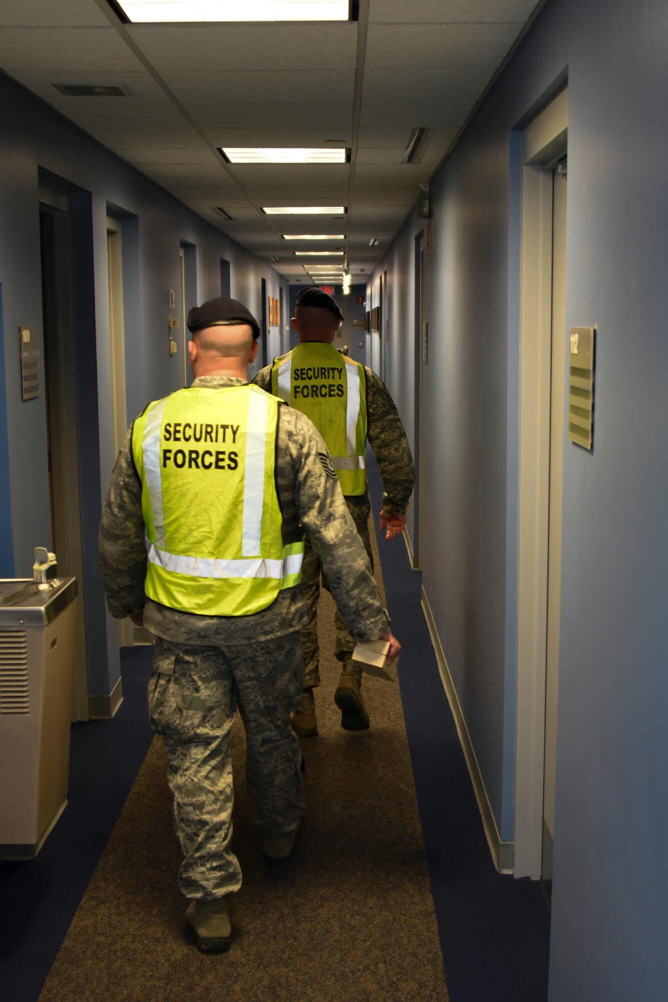 Members of the Security Forces Squadron conduct active shooter training at the 911th International Airport Air Reserve Station, April 3, 2016. Shutting off lights inside of a room and locking the door during an active shooter scenario are ways to increase your odds of survival. (U.S. Air Force Photo by Senior Airman Marjorie A. Bowlden)