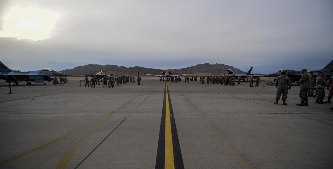 Aircraft that will be used during the 57th Wings Load Crew of the Quarter Competition sit on the flightline before the competition begins at Nellis Air Force Base, Nev., April 8, 2016. The load crews were chosen for their outstanding duty performance and exceptional loading ability for the first quarter. (U.S. Air Force photo by Airman 1st Class Kevin Tanenbaum)