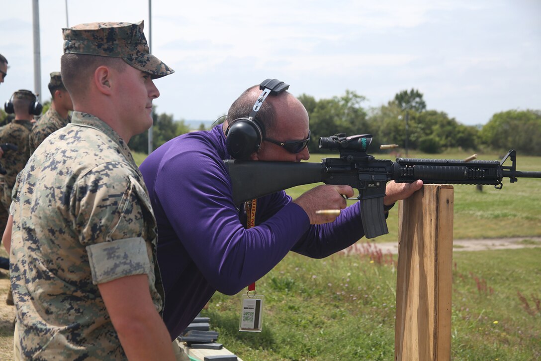 Dennis Dotson, an educator from the greater Jacksonville area, fires down rangeat the firing range aboard Marine Corps Recruit Depot Parris Island, S.C., April 13, 2016. The teachers, coaches, and principals of Recruiting Stations Jacksonville and Montgomery participate in a three-day workshop designed to inform educators about military service and life in the Marine Corps. (Official Marine Corps photo Cpl. John-Paul Imbody)