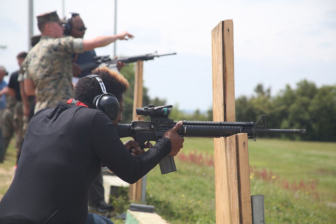 Yulanda Clinton, assistant principal of Theodore High School, prepares to fire down range at the firing range aboard Marine Corps Recruit Depot Parris Island, S.C., April 13, 2016. The teachers, coaches, and principals of Recruiting Stations Jacksonville and Montgomery participate in a three-day workshop designed to inform educators about military service and life in the Marine Corps. (Official Marine Corps photo Cpl. John-Paul Imbody)