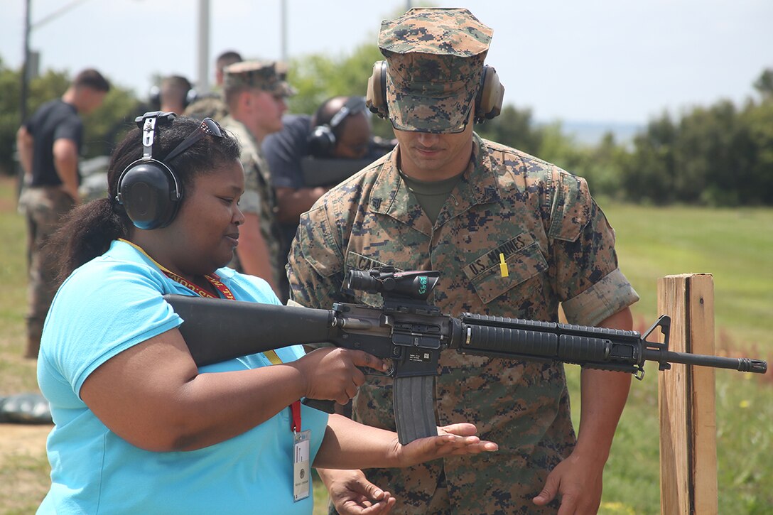 Monica Crenshaw, an educator from the greater Jacksonville area, loads an M16 at the firing range aboard Marine Corps Recruit Depot Parris Island, S.C., April 13, 2016. The teachers, coaches, and principals of Recruiting Stations Jacksonville and Montgomery participate in a three-day workshop designed to inform educators about military service and life in the Marine Corps. (Official Marine Corps photo Cpl. John-Paul Imbody)