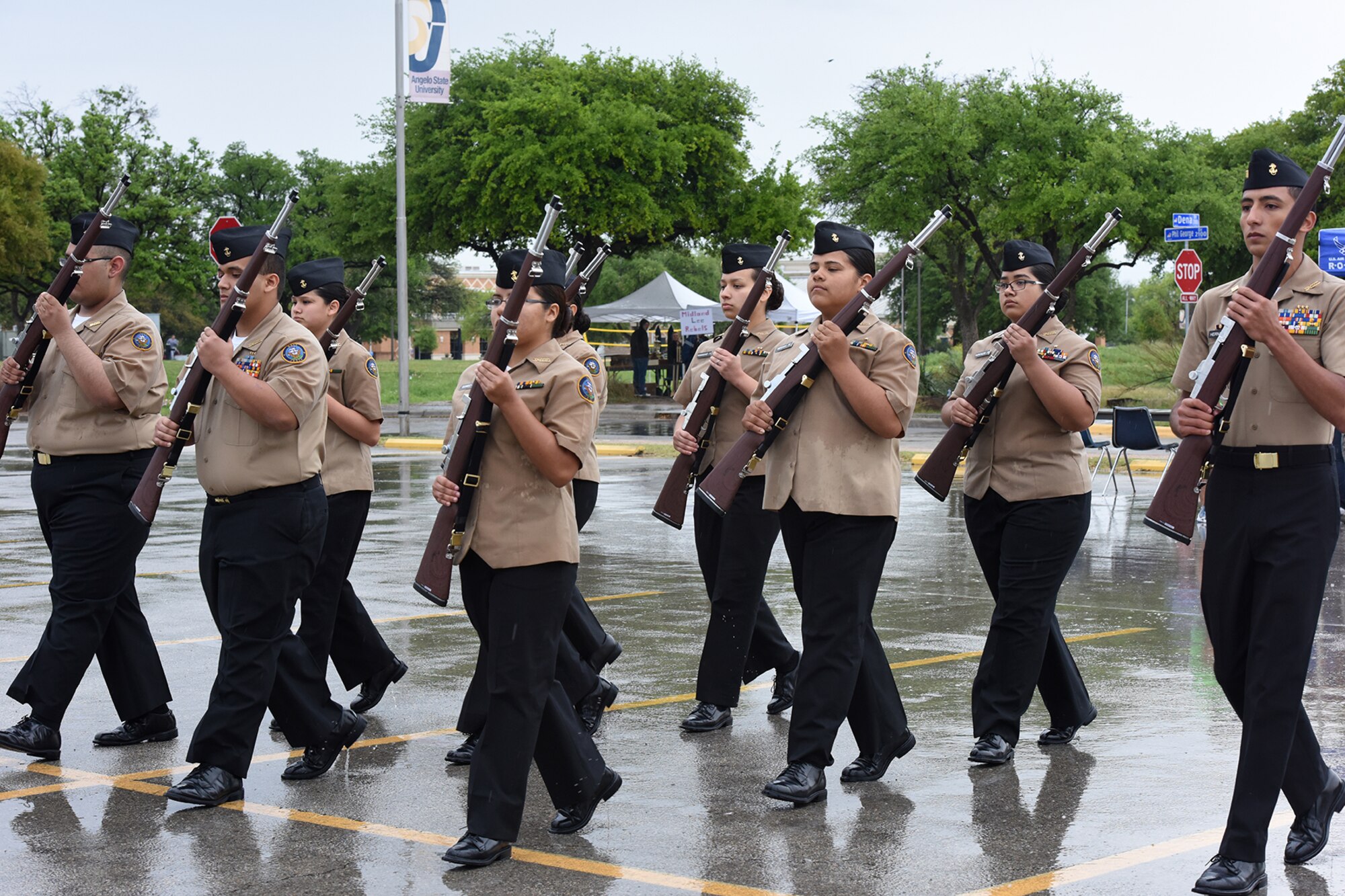 Uvalde High School Navy Junior ROTC drill team members perform an armed regulation drill during the 2016 Angelo State University ROTC Detachment 847, 18th Annual Drill Competition at ASU in San Angelo, Texas, April 9, 2016. The drill team performed a routine from the Marine Corps manual. (U.S. Air Force photo by Staff Sgt. Laura R. McFarlane/Released)