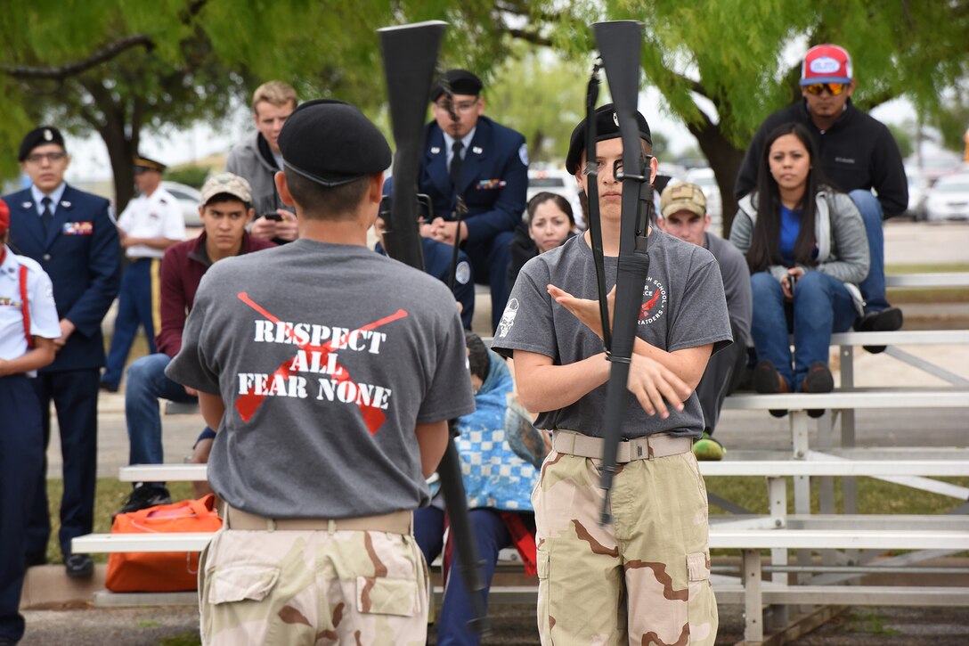 Del Rio High School’s Air Force Junior ROTC drill team members perform an armed tandem routine during the 2016 Angelo State University ROTC Detachment 847, 18th Annual Drill Competition at ASU in San Angelo, Texas, April 9, 2016. Junior ROTCs from the Marine Corps, Navy and Army also participated. (U.S. Air Force photo by Staff Sgt. Laura R. McFarlane/Released)