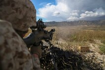 A Marine with Company K, 3rd Battalion, 1st Marine Regiment, 1st Marine Division, fires a M240 medium machine gun during live-fire machine gun target engagement training aboard Marine Corps Base Camp Pendleton, Calif., April 11, 2016. The M240 is a heavier automatic weapon than an M249 Squad Automatic Weapon and provides a higher rate of sustained fire and longer effective range. (U.S. Marine Corps photo by Lance Cpl. Timothy Valero/ Released)