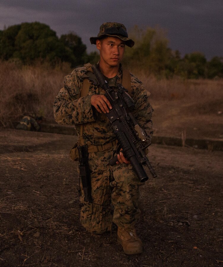 U.S. Marine Cpl. Kevin V. Phan and the Philippine Marines teach each other patrol techniques during Balikatan 16, Panay, Philippines, April 11, 2016. Phan, from Garden Grove, California, is assigned to 2nd Battalion, 2nd Marine Regiment, currently attached to 3rd Marine Division, III Marine Expeditionary Force.  Balikatan provides opportunities for U.S. and Philippine forces to learn from each other and train for potential real world crises, better preparing them to support the local population throughout the Indo-Asia-Pacific region. (U.S. Marine Corps photo by Lance Cpl. Jessica N. Etheridge/Released)