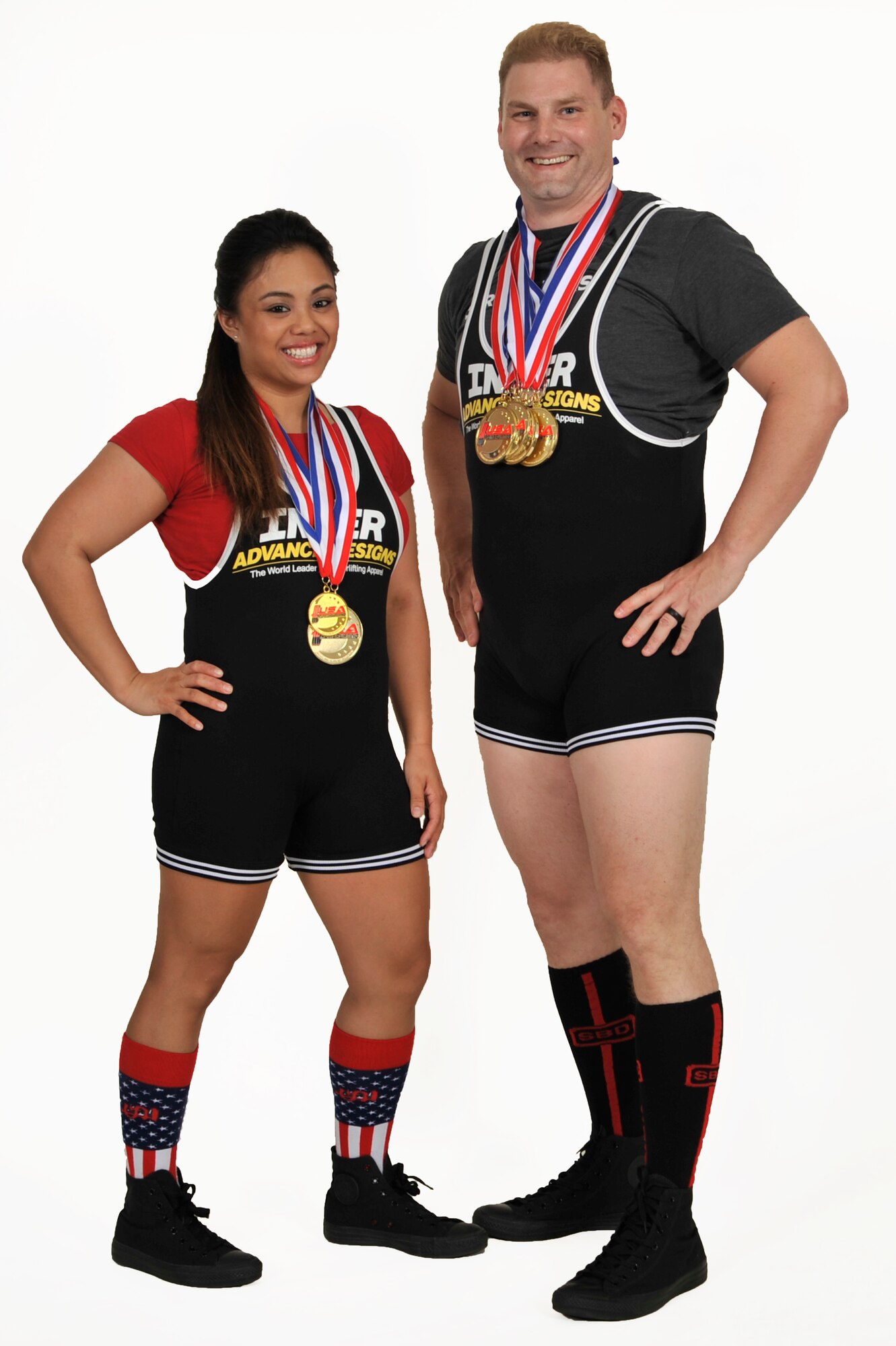 Master Sgt. David Martin and Staff Sgt. Kimberly Francois are a powerlifting team that work out together at Scott Air Force Base, Ill. The duo were coworkers who both found a passion for powerlifting and strive to set state and military records. (U.S. Air Force Photo by Senior Airman Megan Friedl)