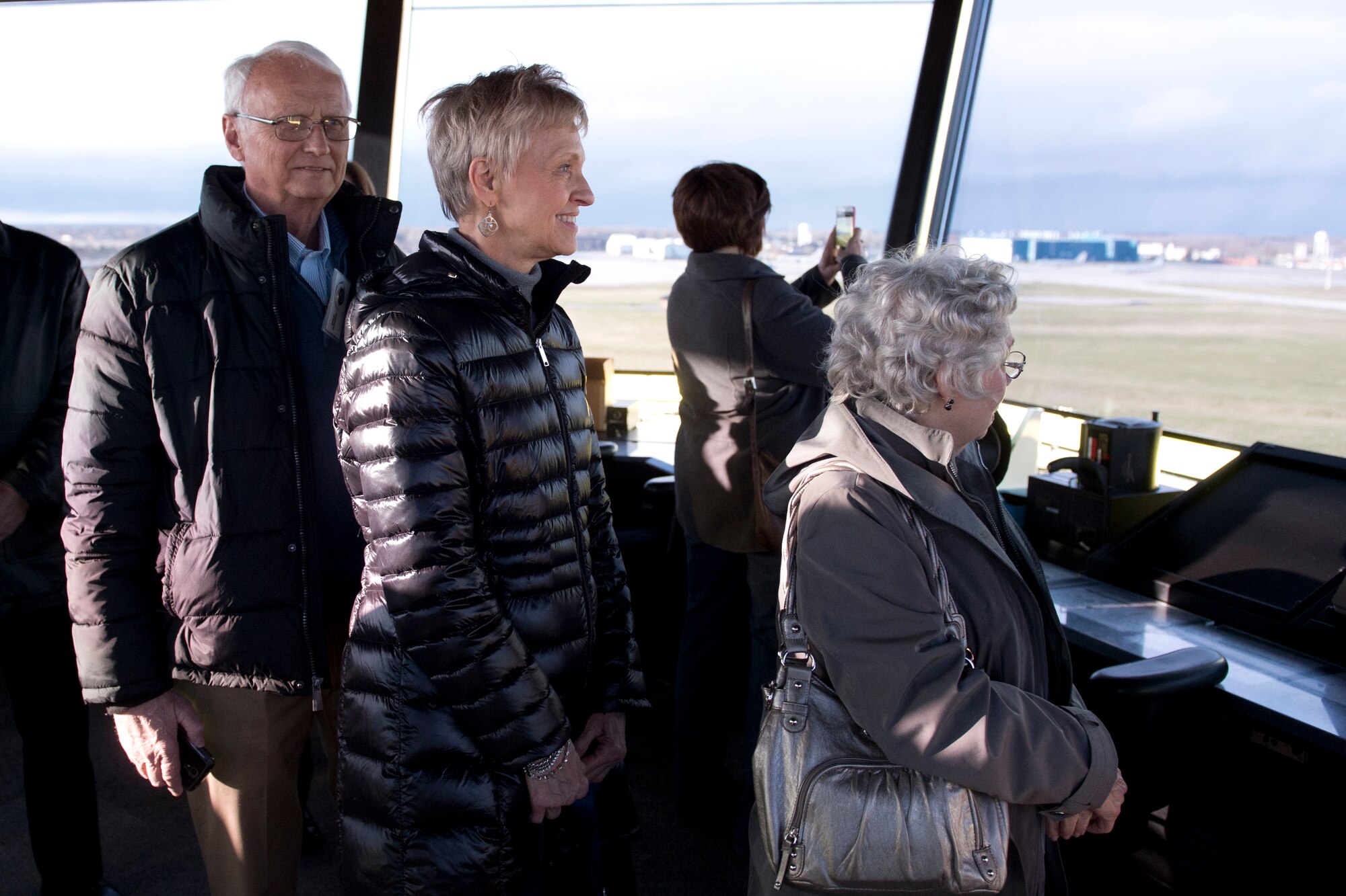 Members of the Grissom Community Council look out the window of Grissom’s air traffic control tower during an immersion event held by the 434th Operations Group at Grissom Air Reserve Base, Ind., April 8, 2016. The 434th Air Refueling Wing regularly hosts events designed to increase community support by showcasing the base’s capabilities to local leaders. (U.S. Air Force photo/Senior Airman Dakota Bergl)
