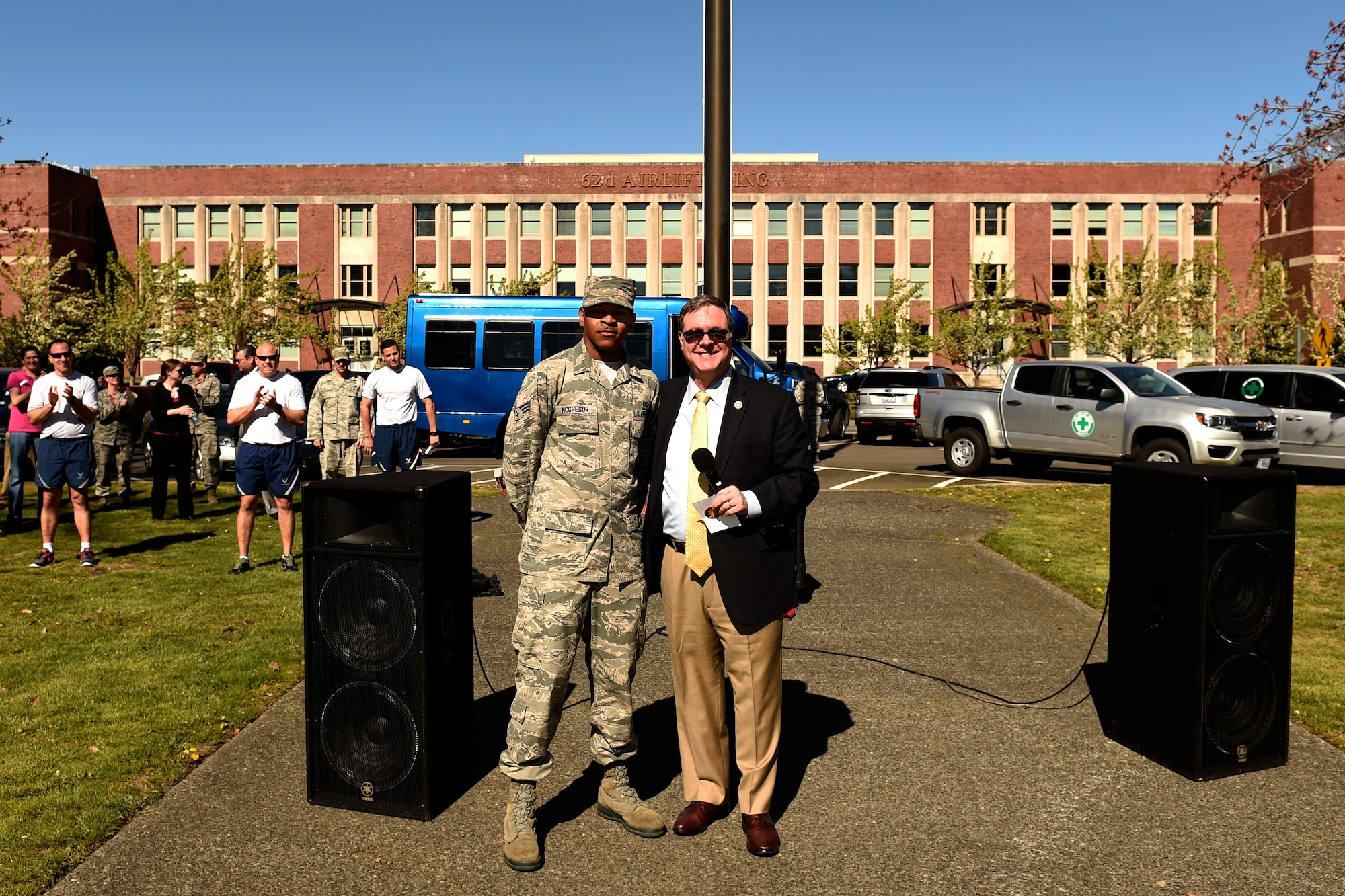 Congressman Denny Heck (right),Representative for the Washington’s 10th Congressional District and Senior Airman Jonathan McGregor, 62nd Operation Support Squadron aircrew flight equipment technician, pose for a photo April 1, 2016 at Joint Base Lewis-McChord, Wash. Representative Heck announced that McGregor was selected for commissioning via the Leaders Encouraging Airmen Development program. (U.S. Air Force photo/Tech Sgt. Tim Chacon)