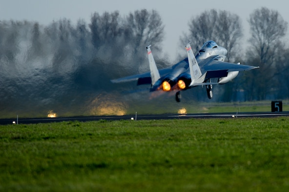 A U.S. Air Force F-15C Eagle fighter aircraft assigned to the 131st Expeditionary Fighter Squadron takes off during a theater security package deployment at Leeuwarden Air Base, Netherlands, April 11, 2016. The F-15s represented a theater security package rotation, which began in the European theater in 2015 to reassure NATO allies and partner nations of the U.S. commitment to the security and stability of Europe. (U.S. Air Force photo by Staff Sgt. Joe W. McFadden/Released)