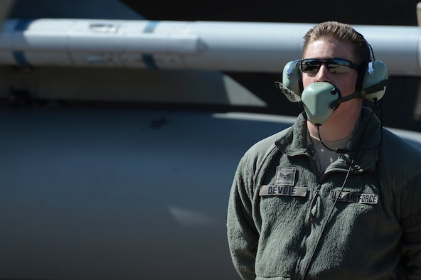 U.S. Air Force and Massachusetts Air National Guard Senior Airman Ben DeVoie, a 104th Aircraft Maintenance Squadron crew chief and East Longmeadow, Mass., native, watches as a 131st Expeditionary Fighter Squadron F-15C Eagle fighter aircraft prepares to taxi on the flightline during a theater security package deployment at Leeuwarden Air Base, Netherlands, April 11, 2016. The squadron will complete a six-month deployment through Europe aimed at reassuring NATO allies and partner nations about the U.S.’s commitment to a European continent that is whole, free and at peace. (U.S. Air Force photo by Staff Sgt. Joe W. McFadden/Released)