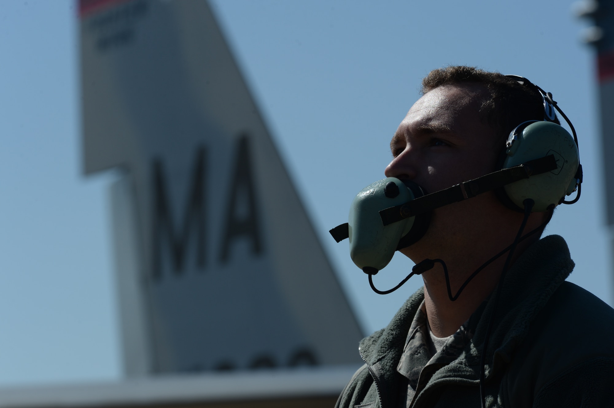U.S. Air Force and Massachusetts Air National Guard Senior Airman Alex Nielsen, a 104th Aircraft Maintenance Squadron crew chief and Easthampton, Mass., native, speaks to a 131st Expeditionary Fighter Squadron pilot inside an F-15C Eagle fighter aircraft on the flightline during a theater security package deployment at Leeuwarden Air Base, Netherlands, April 11, 2016. The squadron’s six-month deployment aims to demonstrate the U.S.’s shared commitment to peace and better prepare allies and partners to respond to a range of potential security and humanitarian challenges. (U.S. Air Force photo by Staff Sgt. Joe W. McFadden/Released)