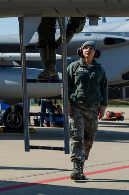 U.S. Air Force and Massachusetts Air National Guard Senior Airman Brittany Dalton, a 104th Aircraft Maintenance Squadron crew chief and Westhampton, Mass., native, watches as a 131st Expeditionary Fighter Squadron pilot boards his F-15C Eagle fighter aircraft on the flightline during a theater security package deployment at Leeuwarden Air Base, Netherlands, April 11, 2016. The squadron’s six-month deployment aims to demonstrate the U.S.’s shared commitment to peace and better prepare allies and partners to respond to a range of potential security and humanitarian challenges. (U.S. Air Force photo by Staff Sgt. Joe W. McFadden/Released)