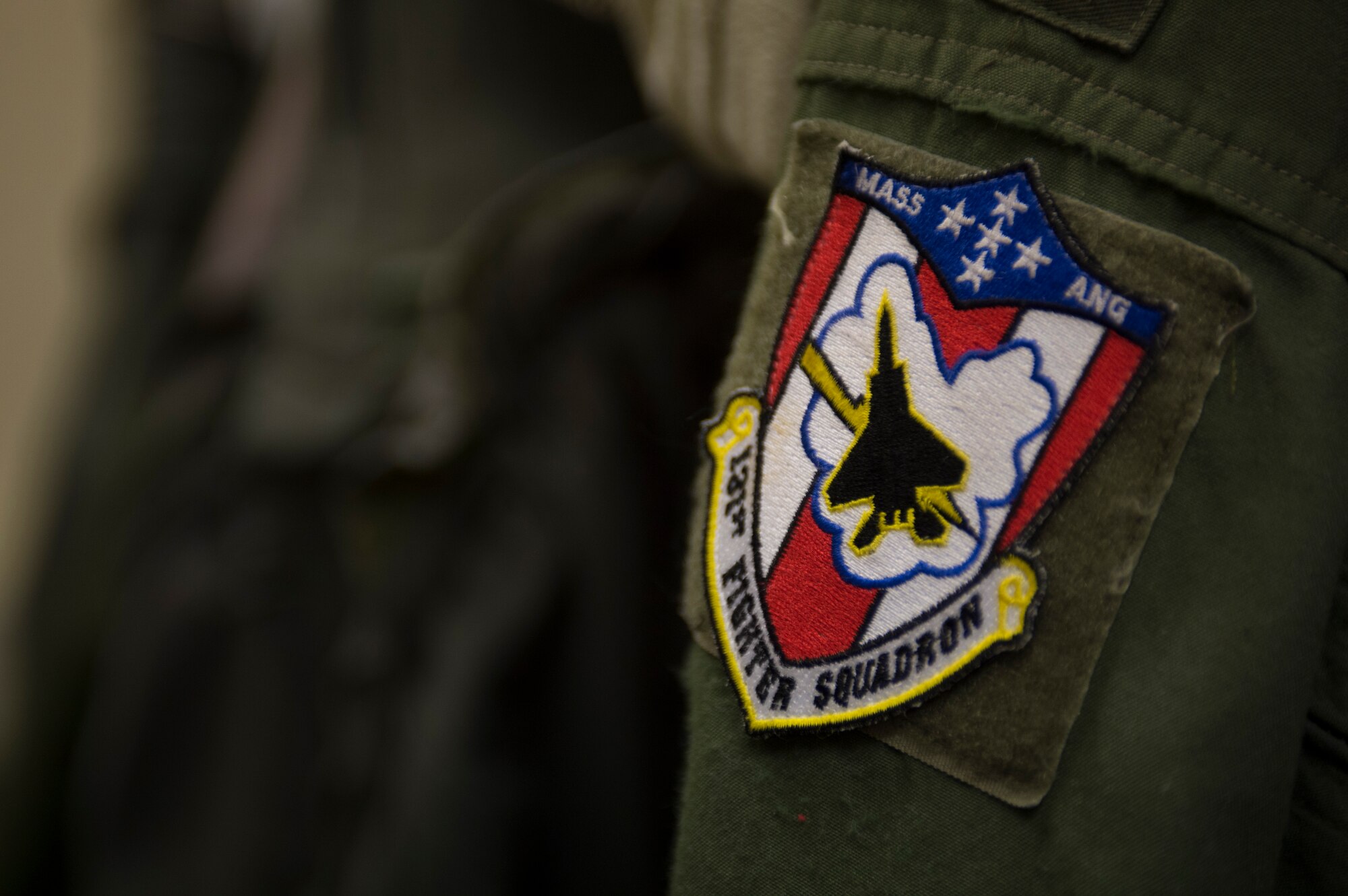 The patch of the 131st Fighter Squadron remains on a flight suit inside an aircrew flight equipment room during a theater security package deployment at Leeuwarden Air Base, Netherlands, April 11, 2016. The squadron served as part of a rotational force aimed at bolstering U.S. capabilities and underscore the U.S. commitment to European security and stability. (U.S. Air Force photo by Staff Sgt. Joe W. McFadden/Released)