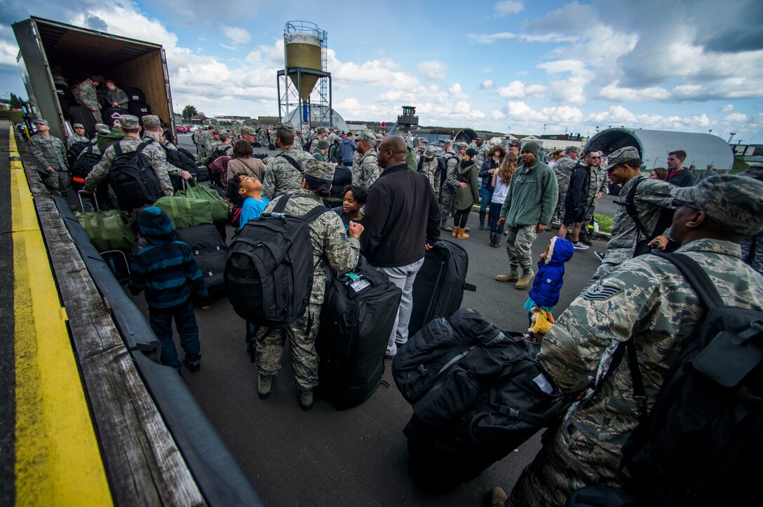 Members of the 480th Aircraft Maintenance Unit check in their luggage before a deployment at the 52nd Logistics Readiness Squadron at Spangdahlem Air Base, Germany, April 7, 2016. Approximately 300 Airmen deployed as part of the 480th FS main body in support of Operation Inherent Resolve. (U.S. Air Force photo by Airman 1st Class Timothy Kim/Released)