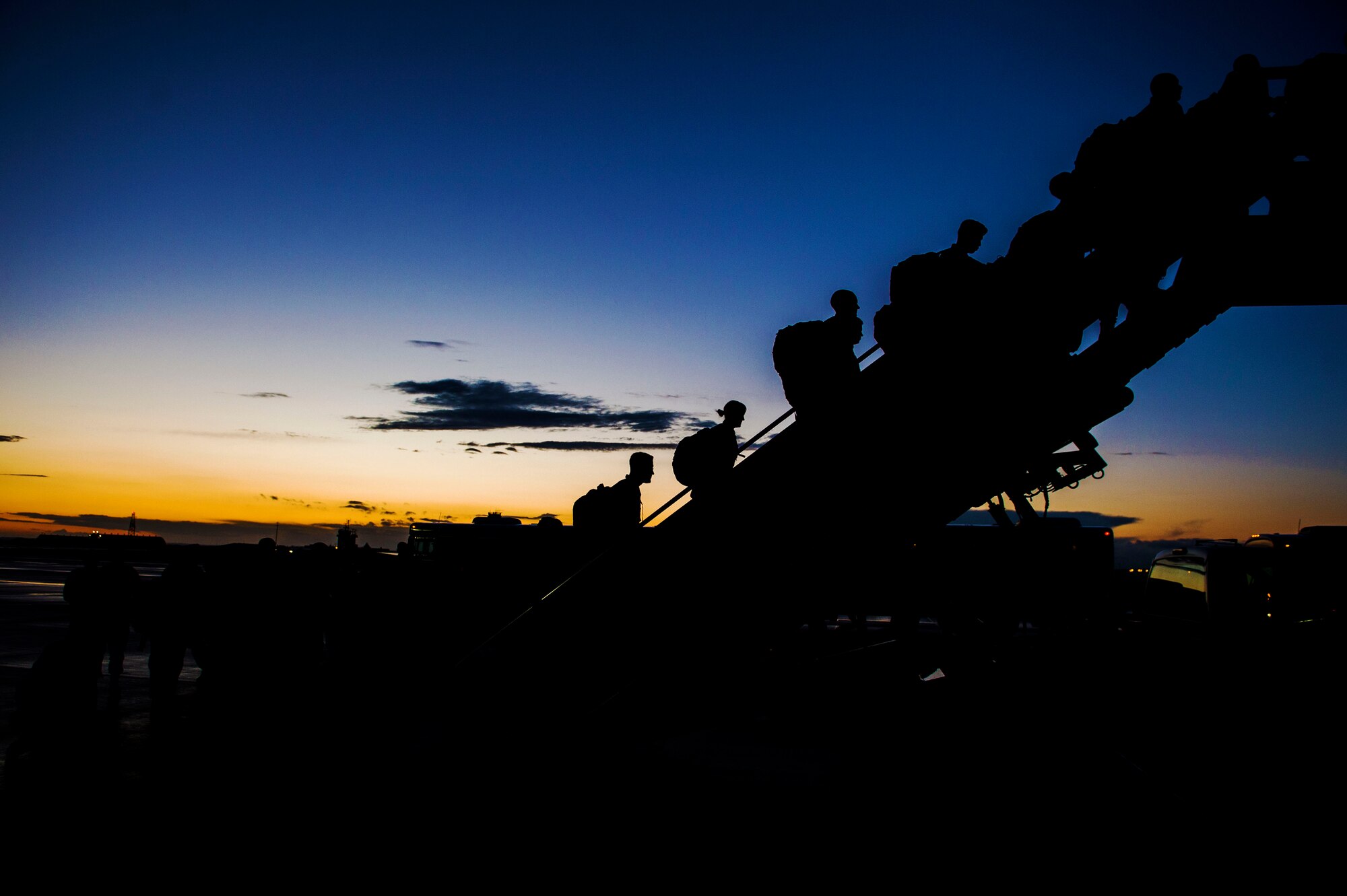 Members of the 480th Aircraft Maintenance Unit board a plane before a deployment at the flight line at Spangdahlem Air Base, Germany, April 7, 2016. The 480th FS and 480th AMU in support of Operation Inherent Resolve. (U.S. Air Force photo by Airman 1st Class Timothy Kim/Released)