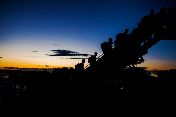 Members of the 480th Aircraft Maintenance Unit board a plane before a deployment at the flight line at Spangdahlem Air Base, Germany, April 7, 2016. The 480th FS and 480th AMU in support of Operation Inherent Resolve. (U.S. Air Force photo by Airman 1st Class Timothy Kim/Released)