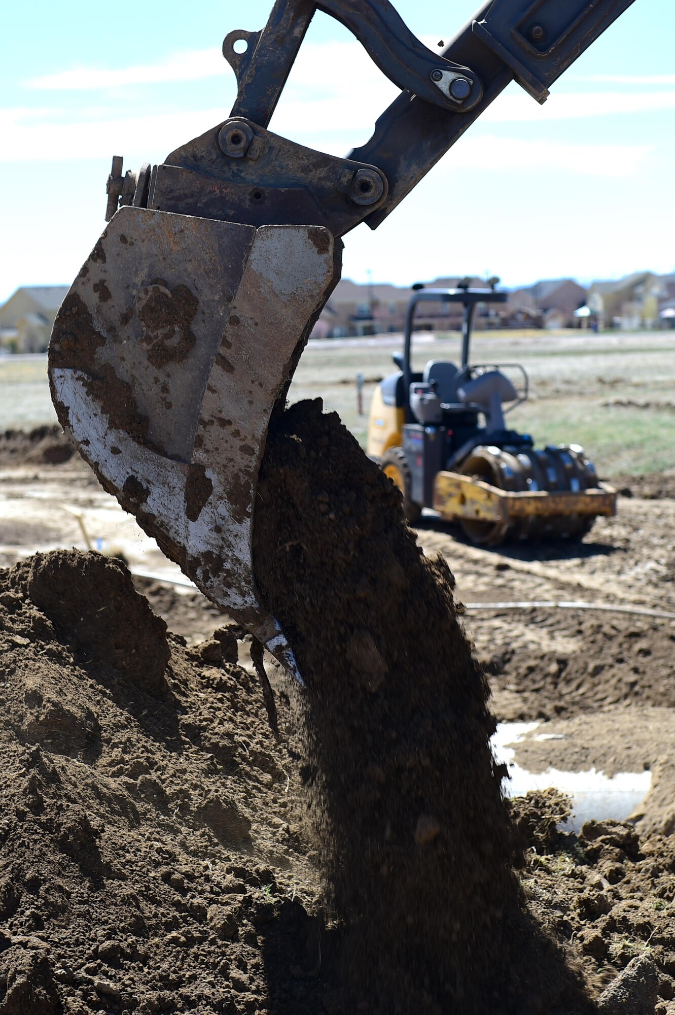 Construction to realign Telluride Street takes place April 6, 2016, on Buckley Air Force Base, Colo. Realigning the street is a project in Building a Better Buckley Together, the 460th Space wing commander’s initiative to improve and maintain the quality of life on base. (U.S. Air Force photo by Airman 1st Class Gabrielle Spradling/Released)