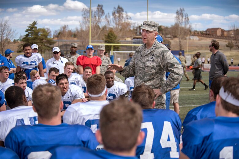 COLORADO SPRINGS, Colo. – Gen. John Hyten, Air Force Space Command commander addresses the United States Air Force Academy Falcons Football Team April 9, 2016 after participating as an honorary coach during an inter-squad practice scrimmage at Falcon-Fort Carson high school. This is only the second time USAFA football has held a practice outside of the Academy. (U.S. Air Force Photo by Craig Denton)
