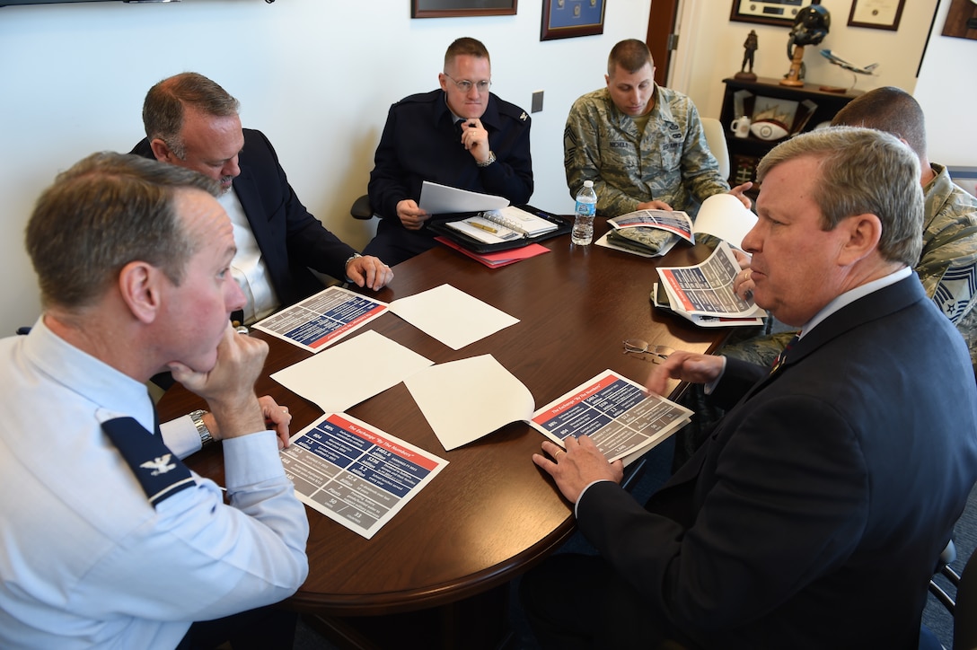 Tom Shull, Army and Air Force Exchange Services director/CEO, and his team sit down with Col. Brad Hoagland, JBA and 11th Wing commander, Col. Bill Kale, 11th Mission Support Group commander, and Chief Master Sgt. Steve Nichols, acting 11th Wing Command Chief, to discuss ongoing renovations and expansions for the Base Exchange at JBA, Md., April 13, 2016. Team Andrews is improving its Exchange facilities to provide a one-stop shop for Andrews Airmen and their families. (U.S. Air Force photo by Senior Airman Joshua R. M. Dewberry/RELEASED)