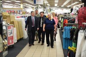 Tom Shull, Army and Air Force Exchange Services director/CEO, Chief Master Sgt. Sean Applegate, Exchange senior enlisted advisor, and their team are given a tour of the Joint Base Andrews Exchange during its renovations and expansions from Exchange management at JBA, Md., April 13, 2016. Team Andrews is improving its Exchange facilities to provide a one-stop shop for Andrews Airmen and their families. (U.S. Air Force photo by Senior Airman Joshua R. M. Dewberry/RELEASED)