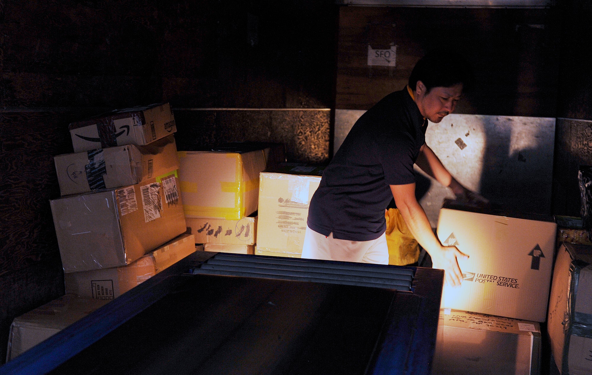Hironaga Akamine, 18th Communications Squadron postal clerk, organizes outgoing mail into the truck at the Kadena Post Office April 12, 2016, at Kadena Air Base, Japan. A total of 18 Japanese employees work at Kadena Post Office in a two shift system. (U.S. Air Force photo by Naoto Anazawa)




