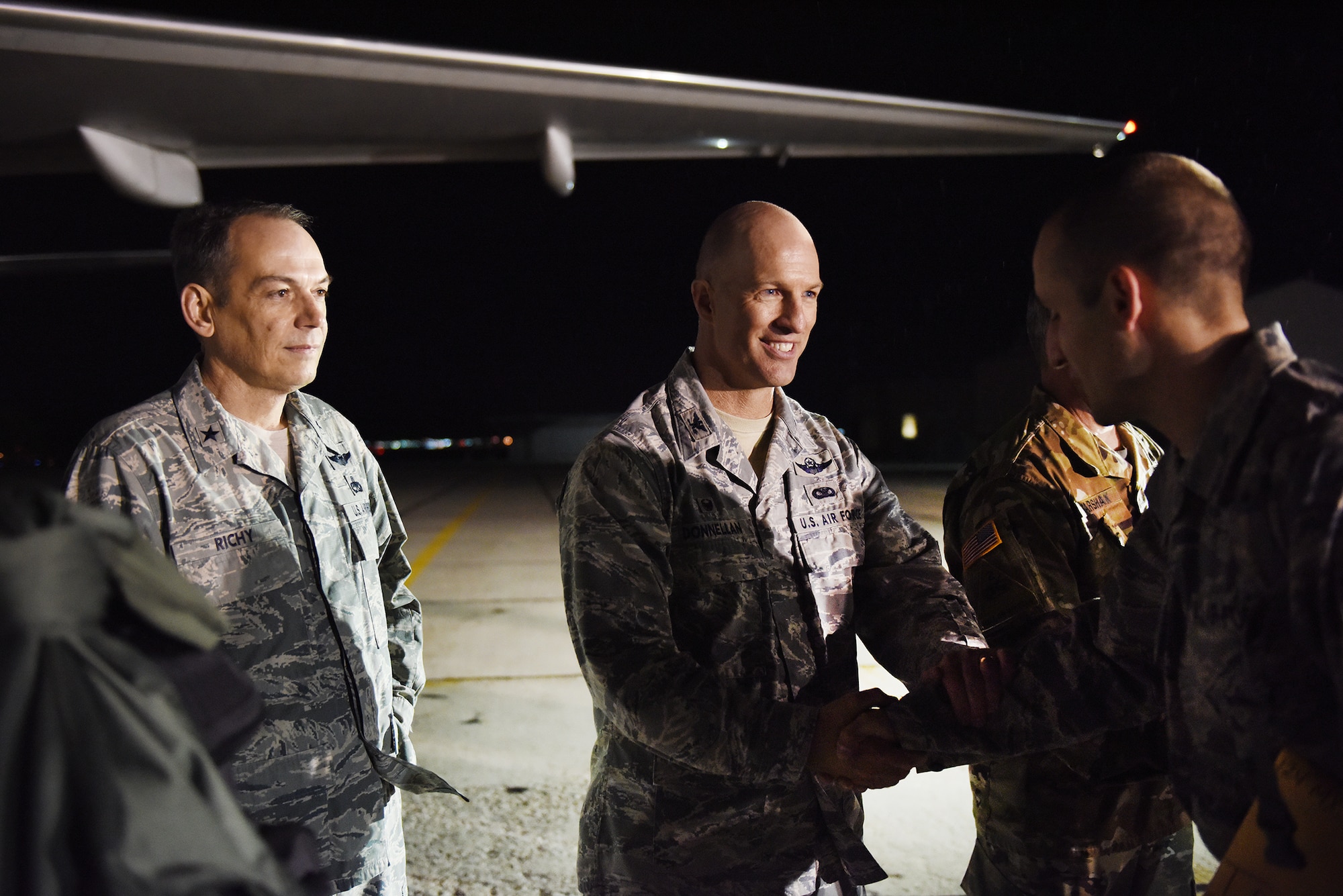 Airmen from the Idaho Air National Guard's 124th Fighter Wing say farewell to family, friends and distinguished visitors on the flight line at Gowen Field in preparation for deployment April 12, 2016. Col. Tim Donnellan, the 124th Fighter Wing commander, wishes Airmen a farewell as they depart Tuesday evening. Most of the deploying Guard members will be in the Middle East supporting Operation Inherent Resolve. (U.S. Air National Guard photo by Master Sgt. Becky Vanshur/Released)