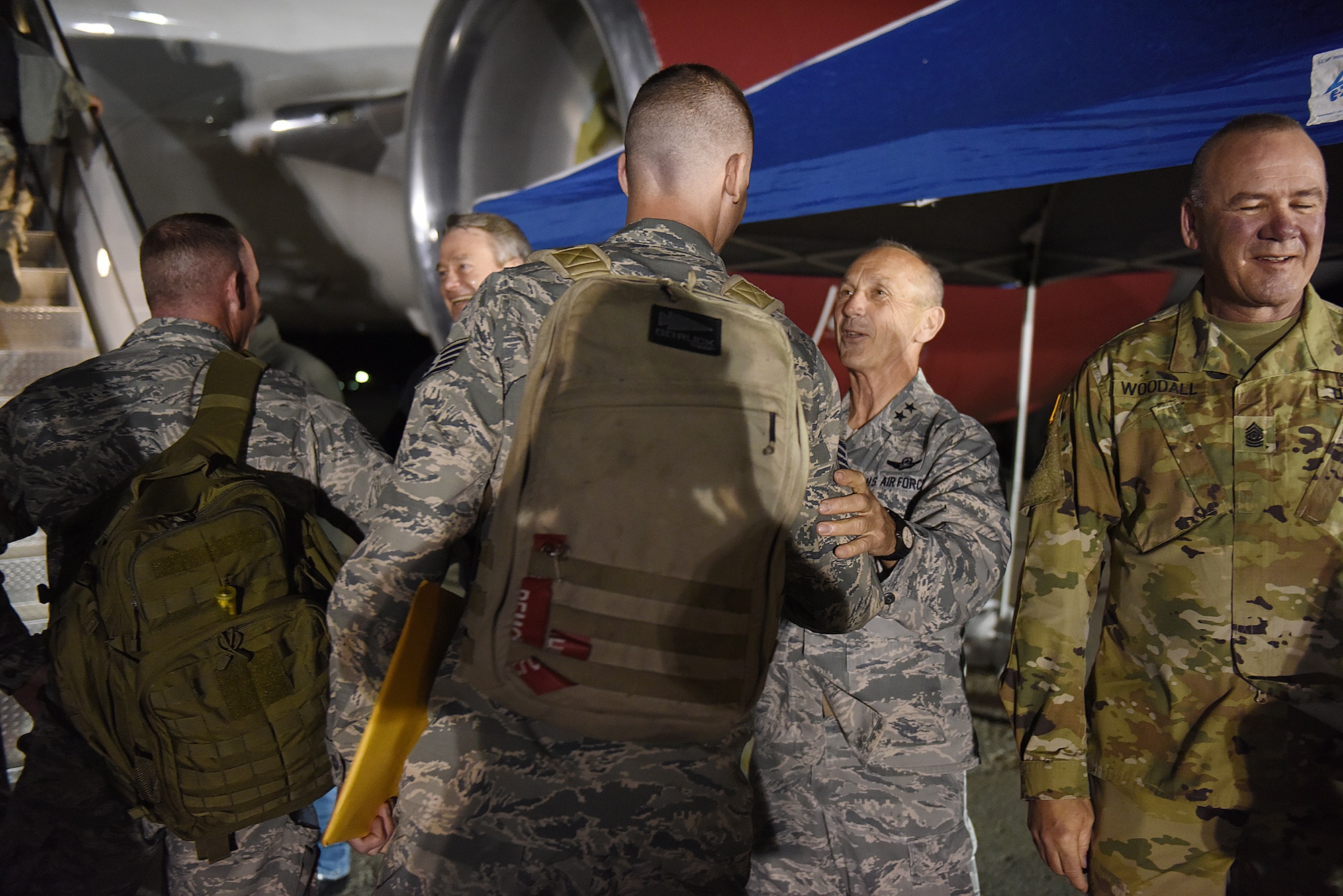 Airmen from the Idaho Air National Guard's 124th Fighter Wing say farewell to family, friends and distinguished visitors on the flight line at Gowen Field in preparation for deployment April 12, 2016. Maj. Gen. Gary Sayler, Idaho’s Commanding General, wishes Airmen a farewell as they depart Tuesday evening. Most of the deploying Guard members will be in the Middle East supporting Operation Inherent Resolve. (U.S. Air National Guard photo by Master Sgt. Becky Vanshur/Released)