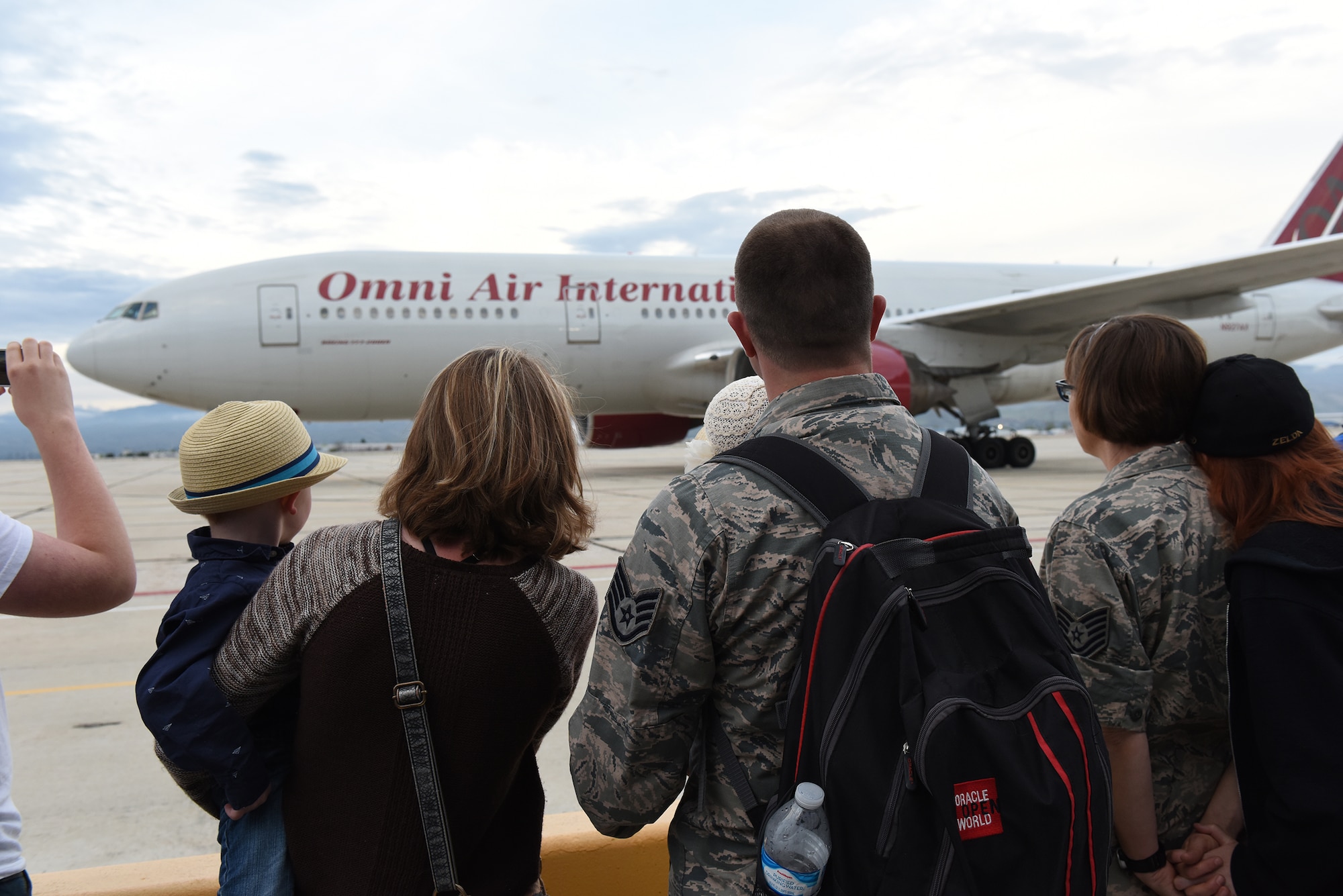 Airmen from the Idaho Air National Guard's 124th Fighter Wing gather on the flight line at Gowen Field in preparation for deployment April 12, 2016. Most of the deploying Guard members will be in the Middle East supporting Operation Inherent Resolve. (U.S. Air National Guard photo by Master Sgt. Becky Vanshur/Released)