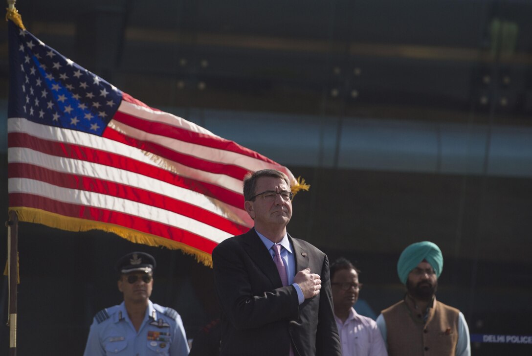 Defense Secretary Ash Carter renders honors during a repatriation ceremony in New Delhi, April 13, 2016, to mark the return of possible remains of U.S. service members lost in World War II. DoD photo by Air Force Senior Master Sgt. Adrian Cadiz