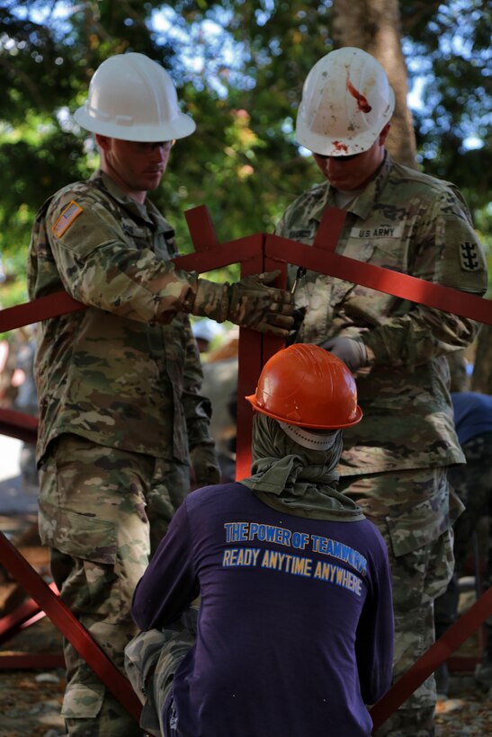 Philippine Navy Seabees and U.S. Soldiers with 130th Engineering Brigade, build a multipurpose facility in Matahimik-Bucana elementary school in Puerto Princesa, Philippines during exercise Balikatan April 8, 2016.  Balikatan, which means "shoulder to shoulder" in Filipino, is an annual bilateral training exercise focused on improving the ability of Philippine and U.S. military forces to work together during planning, contingency and humanitarian assistance and disaster relief operations. 