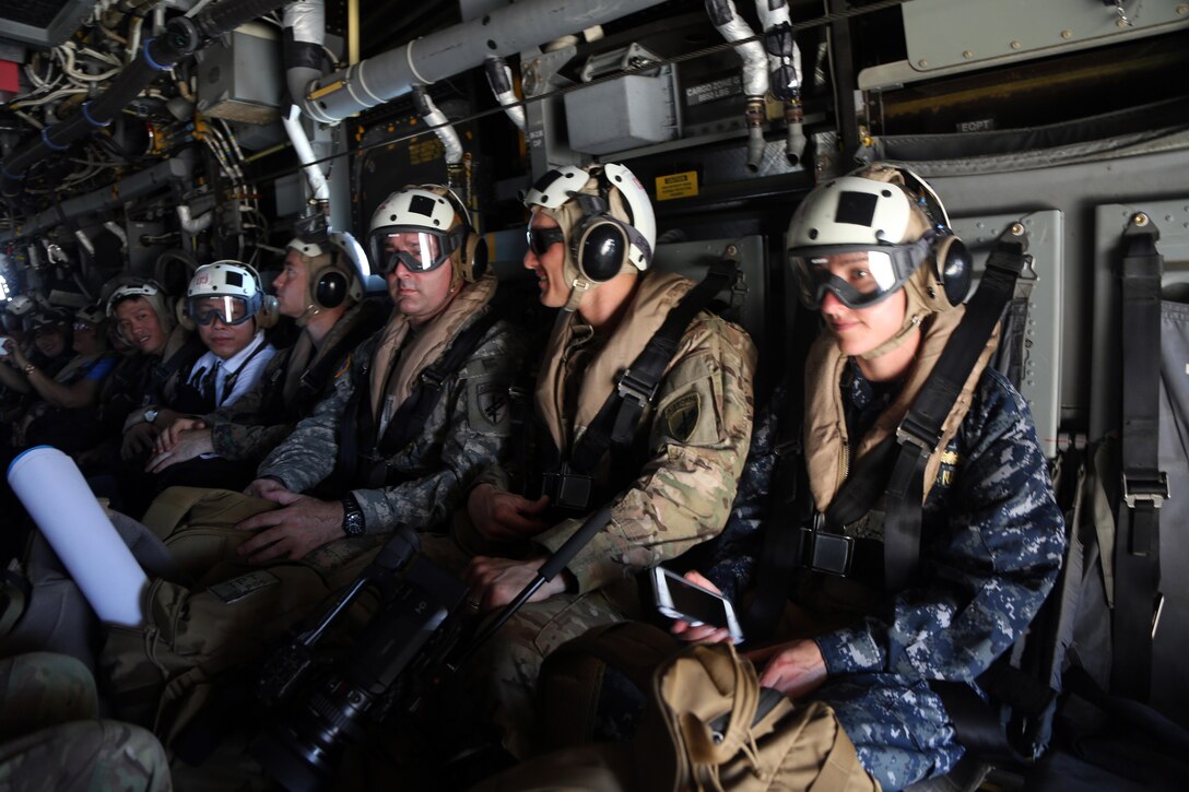 Philippine, Austrailian and U.S. service members ride in an MV-22 from Marine Medium Tilt-rotor squadron 262 to a cooperative health engagement in Cagayancillo, Philippines April 10, 2016.  Balikatan, which means "shoulder to shoulder" in Filipino, is an annual bilateral training exercise focused on improving the ability of Philippine and U.S. military forces to work together during planning, contingency and humanitarian assistance and disaster relief operations. 