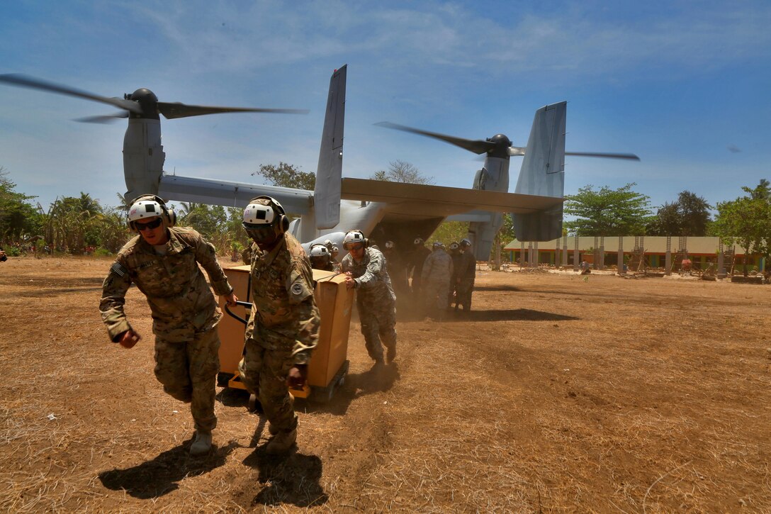 Philippine, Austrailian and U.S. service members participate in a cooperative health engagement during exercise Balikatan in Cagayancillo, Philippines April 10, 2016.  Balikatan, which means "shoulder to shoulder" in Filipino, is an annual bilateral training exercise focused on improving the ability of Philippine and U.S. military forces to work together during planning, contingency and humanitarian assistance and disaster relief operations. 