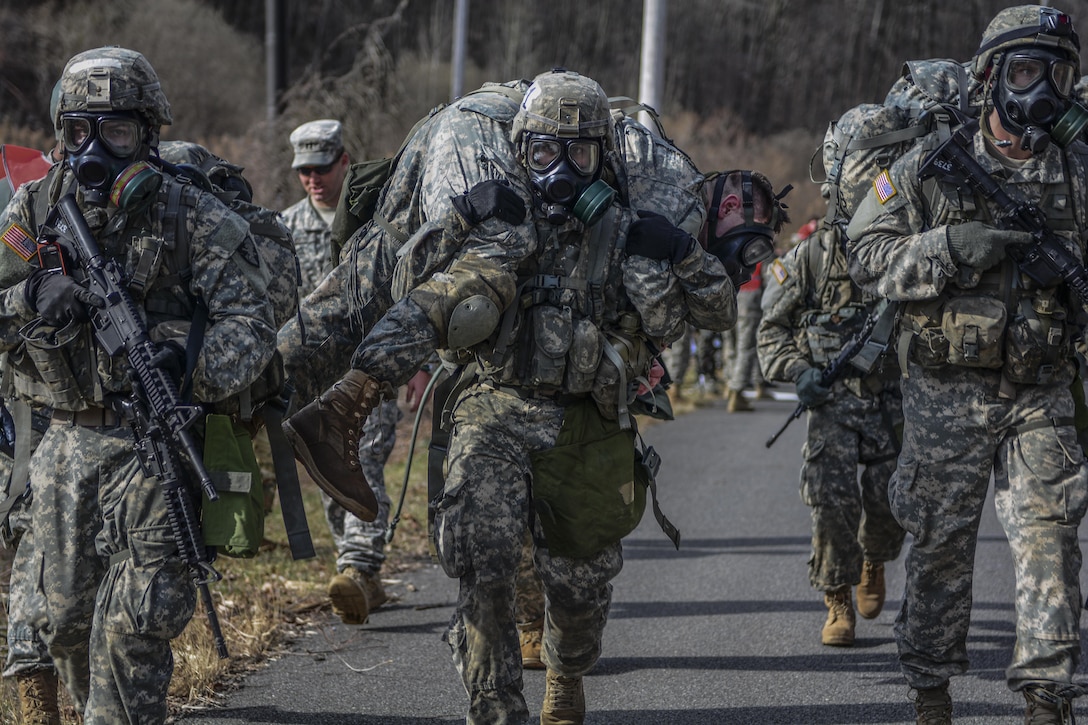 Army cadets carry simulated casualties and their gear 560 meters at the chemical, biological, radiological and nuclear station during the 2016 Sandhurst Competition at West Point, N.Y., April 9, 2016. Army photo by Sgt. 1st Class Brian Hamilton