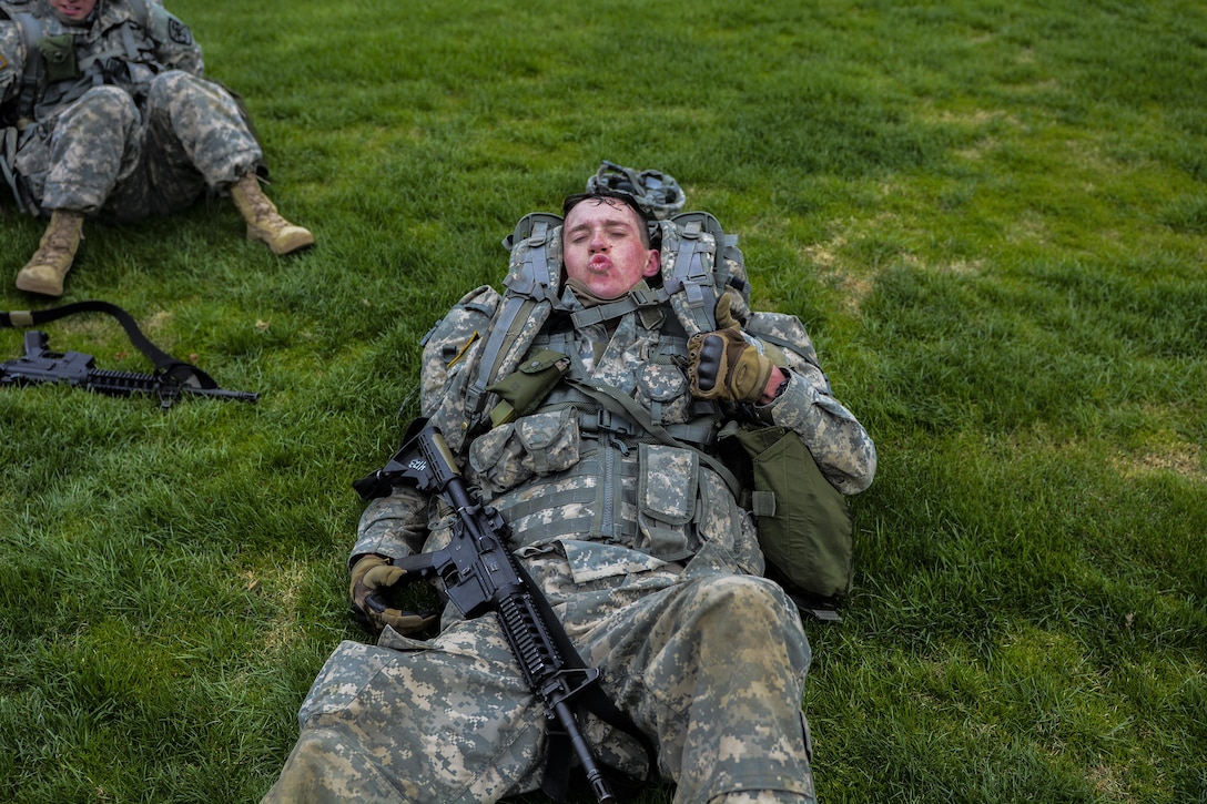 University of Delaware ROTC cadets lay down to rest during the 2016 Sandhurst Competition at West Point, N.Y., April 9, 2016. All the cadets covered over 35 miles with a 35-pound ruck sack duirng two days of competition. Army photo by Sgt. 1st Class Brian Hamilton