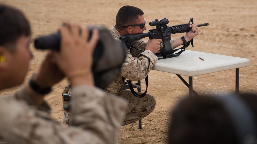 1st Lt. Jeremy Spray, motor transport officer, 1st Combat Engineer Battalion, fires an M4 service rifle during the Western Regional Combat Match at Marine Corps Air Ground Combat Center, April 7, 2016.