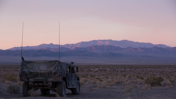 A High Mobility Multipurpose Wheeled Vehicle with 7th Marine Regiment stages at the Lead Mountain training area during the Regiment’s Combined Arms Live Fire Exercise at Marine Corps Air Ground Combat Center, April 5, 2016. CALFEX served as the kinetic portion of Desert Scimitar 16, an annual 1st Marine Division training evolution.  