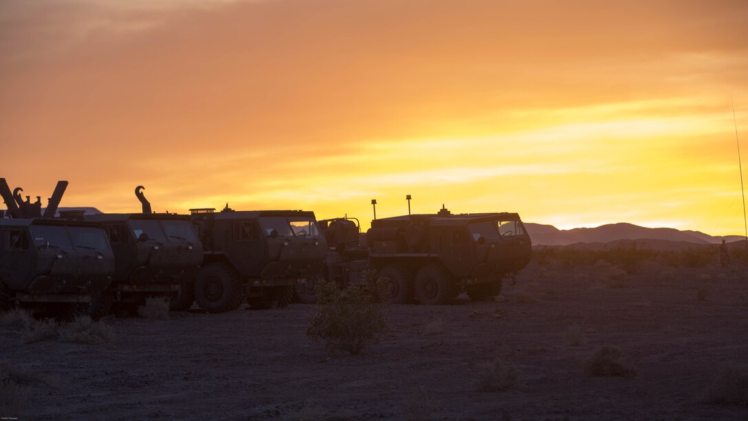 Logistics Vehicle System Replacements with Combat Logistics Battalion 7, prepare to move equipment at the Lead Mountain training area during 7th Marine Regiment’s Combined Arms Live Fire Exercise at Marine Corps Air Ground Combat Center, April 5, 2016. CALFEX served as the kinetic portion of Desert Scimitar 16, an annual 1st Marine Division training evolution. 