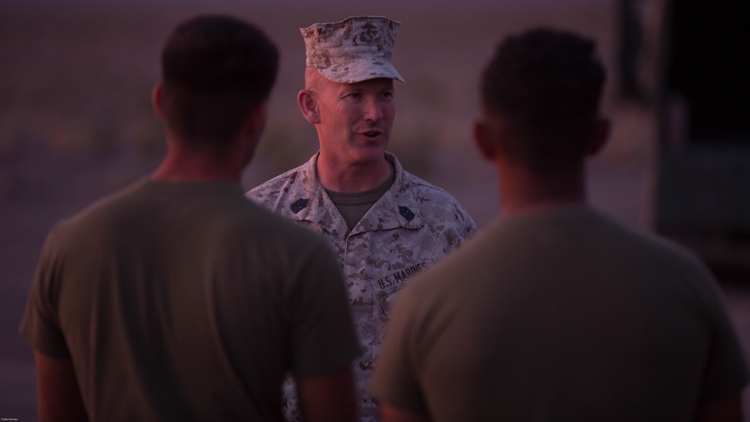 Sergeant Maj. William Sowers, 1st Marine Division Sergeant Major, talks to Marines of 7th Marine Regiment during the regiment’s Combined Arms Live Fire Exercise at Marine Corps Air Ground Combat Center, April 5, 2016. CALFEX served as the kinetic portion of Desert Scimitar 16, an annual 1st Marine Division training evolution. 