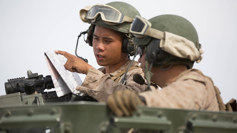 Marines with Company C, 3rd Light Armored Reconnaissance Battalion, plan their route during the offensive portion of 7th Marine Regiment’s Combined Arms Live Fire Exercise at Marine Corps Air Ground Combat Center April 5, 2016. CALFEX served as the kinetic portion of Desert Scimitar 16, an annual 1st Marine Division training evolution. 