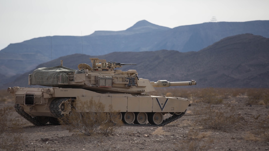 An M1A1 Abrams Main Battle Tank with Company B, 1st Tank Battalion, prepares to move toward its objective in the Blacktop training area during 7th Marine Regiment’s Combined Arms Live Fire Exercise at marine Corps Air Ground Combat Center April 6, 2016. CALFEX served as the kinetic portion of Desert Scimitar 16, an annual 1st Marine Division training evolution.