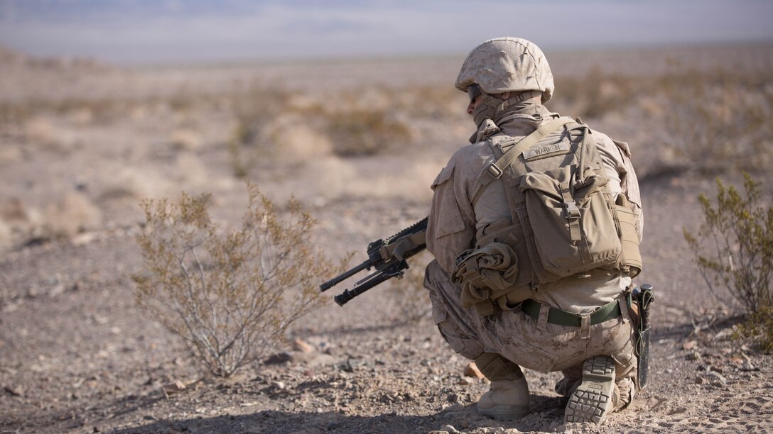 Lance Cpl. Daniel Warren, rifleman, Company C, 3rd Light Armored Reconnaissance Battalion, provides security in the Blacktop training area as part of the defensive portion of 7th Marine Regiment’s Combined Arms Live Fire Exercise at Marine Corps Air Ground Combat Center April 6, 2016. CALFEX served as the kinetic portion of Desert Scimitar 16, an annual 1st Marine Division training evolution. 