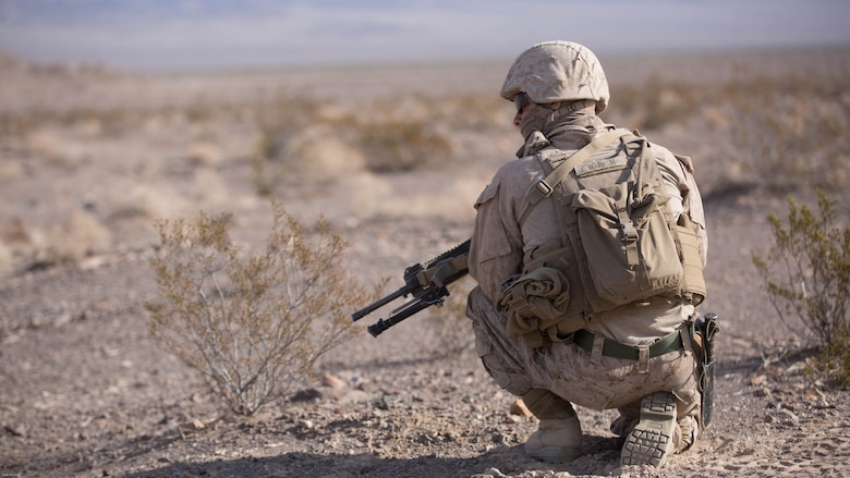 Lance Cpl. Daniel Warren, rifleman, Company C, 3rd Light Armored Reconnaissance Battalion, provides security in the Blacktop training area as part of the defensive portion of 7th Marine Regiment’s Combined Arms Live Fire Exercise at Marine Corps Air Ground Combat Center April 6, 2016. CALFEX served as the kinetic portion of Desert Scimitar 16, an annual 1st Marine Division training evolution. 