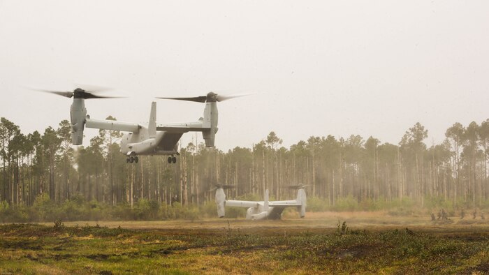 A V-22 Osprey lands to insert Marines with 2nd Battalion, 8th Marine Regiment during a platoon attack training event at Marine Corps Base Camp Lejeune, N.C., April 12, 2016. The training was focused on ensuring the Marines understood the fundamentals of operating efficiently on a larger scale to prepare for potential future engagements. 