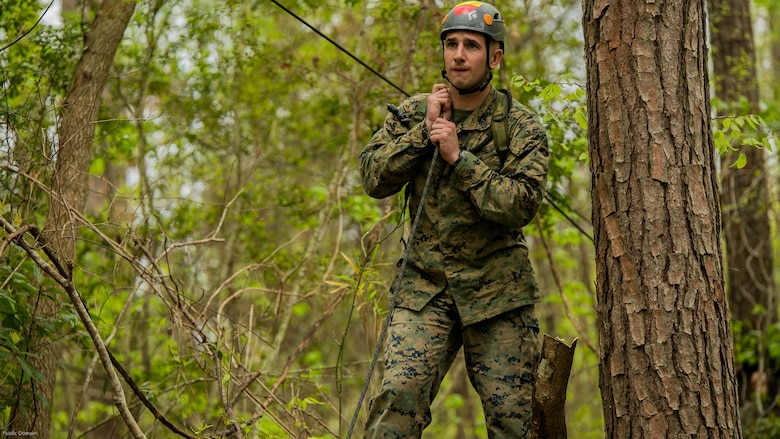 Sgt. Ryan Adams, an instructor for the Assault Climbers Course, tightens the slack from the suspension bridge at Marine Corps Base Camp Lejeune, N.C., April 12, 2016. These bridges allow Marines from the 22nd Marine Expeditionary Unit to conduct cliff assaults, and move supplies and themselves safely across a river or cavern.