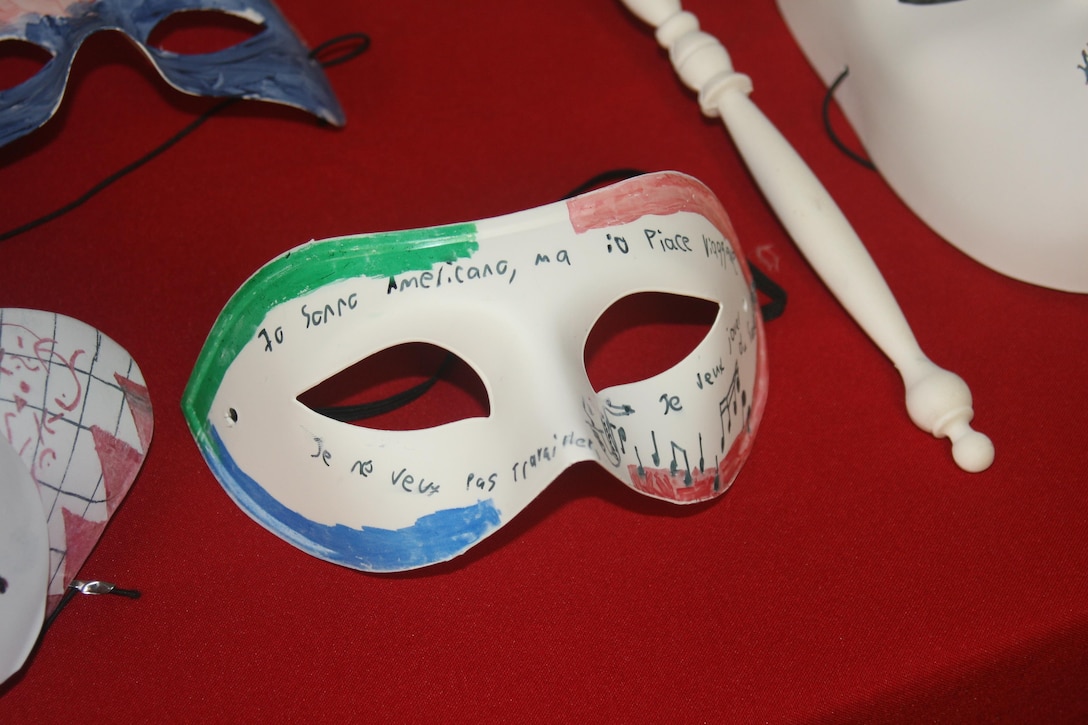 Masks decorated by Marines in the Consolidated Substance Abuse Counseling Center’s intensive outpatient treatment program in March are displayed during a Family Advocacy Program open house Apr. 7. Participants used the masks to express the feelings they use alcohol to cover or hide from the world. April is national Alcohol Awareness Month.