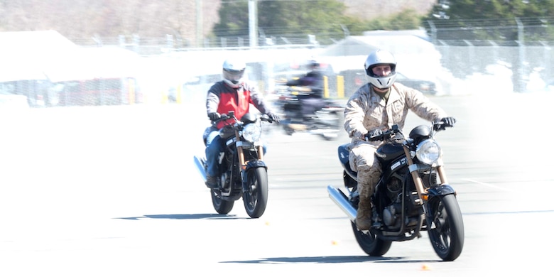 A class of six motorcyclists attends a Basic Riders Course at Camp Upshur aboard Marine Corps Base Quantico. The nine-acre course allows novice motorcyclists to practice riding in a controlled environment.