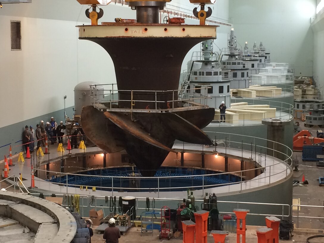 Crews work to modernize the Corps hydropower facilities on Apr. 7, 2016, when workers at Lower Monumental Lock and Dam lifted the unit 1 turbine out of the turbine pit. The work of the hub linkage upgrade of unit 1 at Lower Monumental involves the complete disassembly of the turbine runner. 