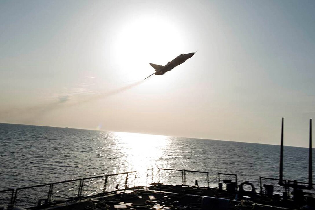 A Russian Sukhoi Su-24 attack aircraft makes a very low altitude pass by the guided missile destroyer USS Donald Cook while the ship was operating in international waters in the Baltic Sea, April 12, 2016. Navy photo
